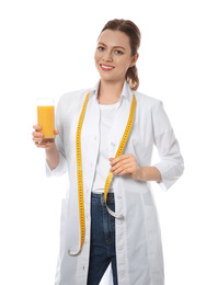 Nutritionist with glass of juice on white background