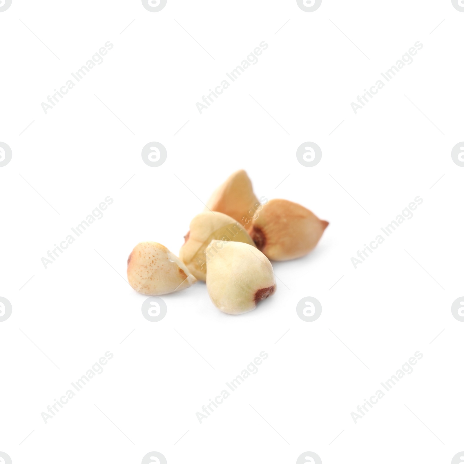 Photo of Organic green buckwheat grains isolated on white