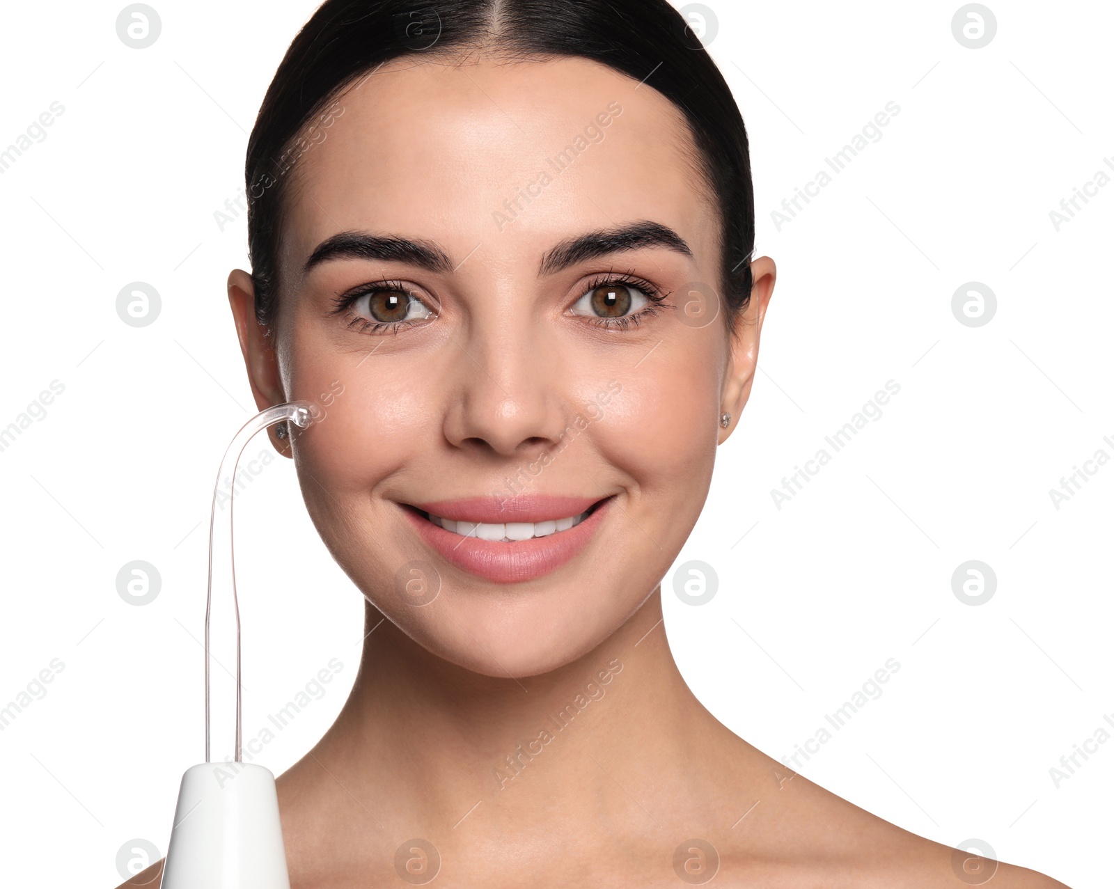 Photo of Woman using high frequency darsonval device on white background