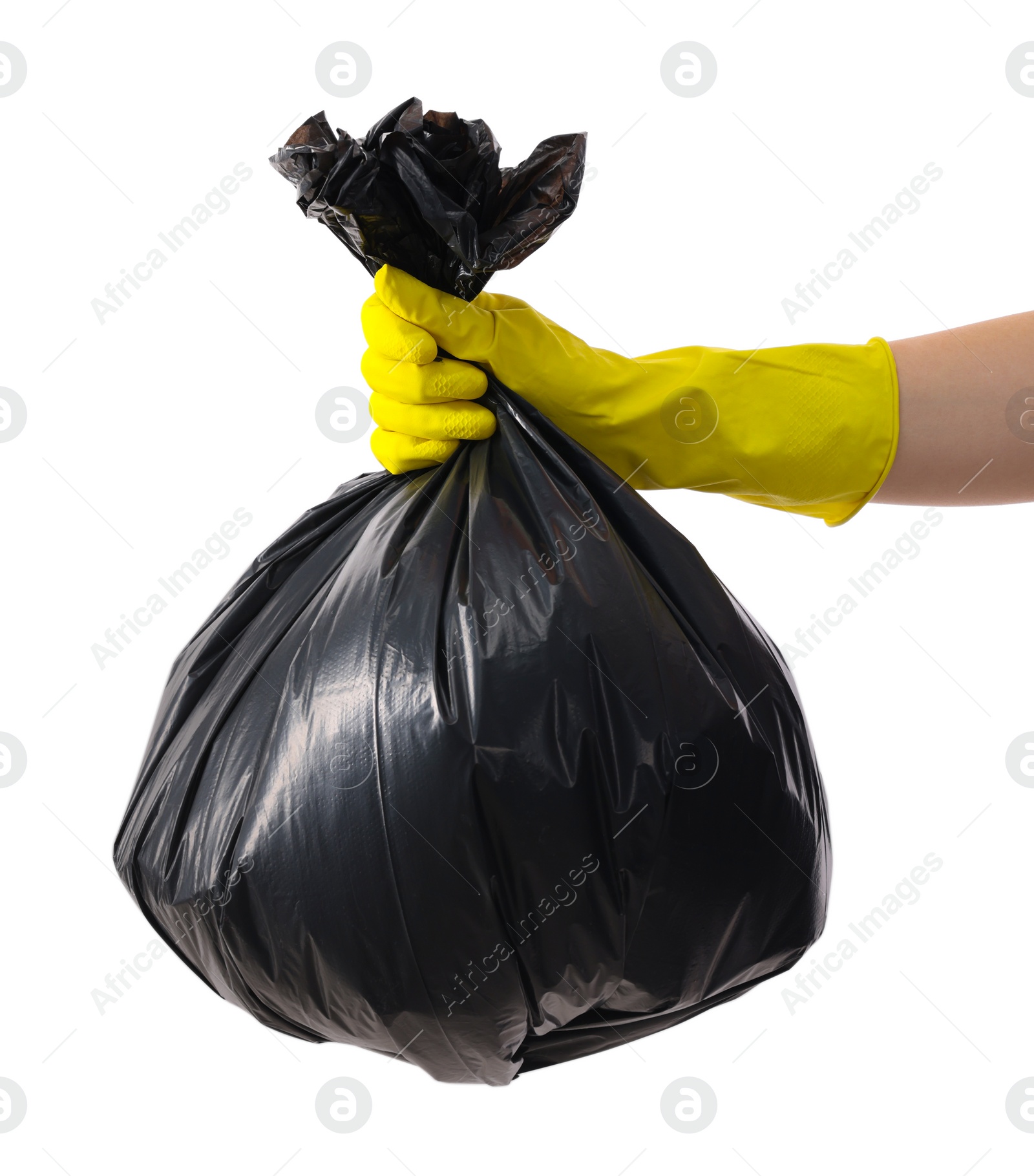 Photo of Woman holding plastic bag full of garbage on white background, closeup