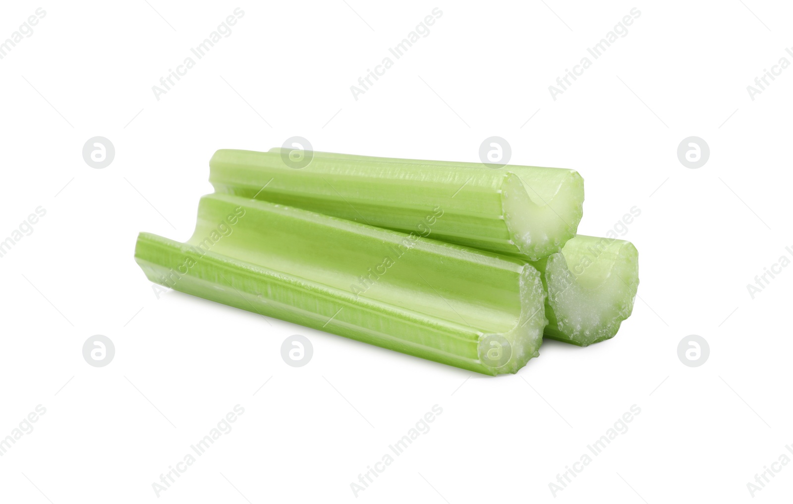 Photo of Fresh green cut celery isolated on white