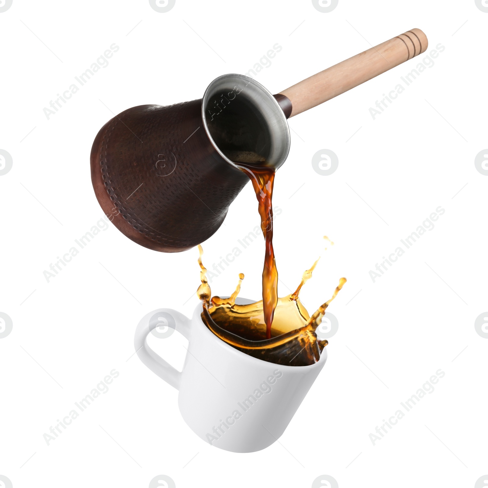 Image of Pouring freshly brewed aromatic coffee from turkish pot into cup. Objects in air on white background