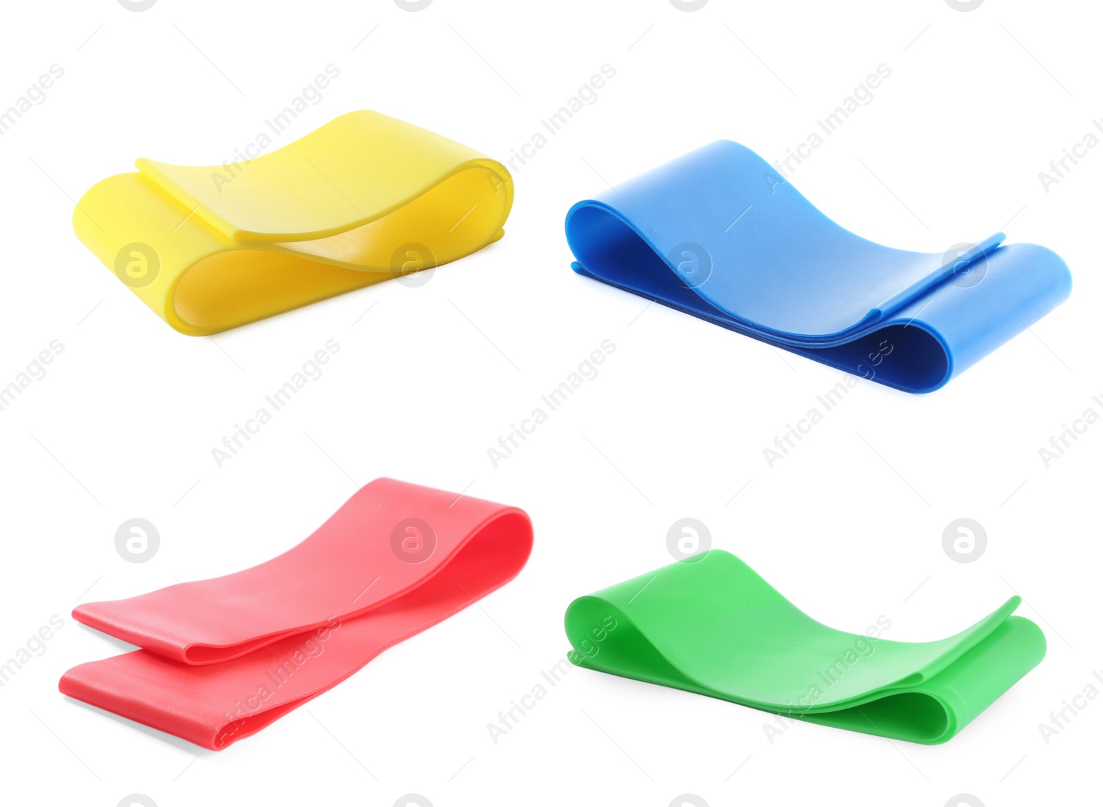 Image of Set of different fitness elastic bands on white background 