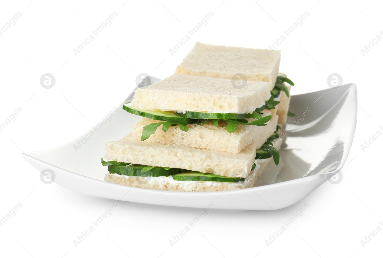 Photo of Plate with cucumber sandwiches isolated on white