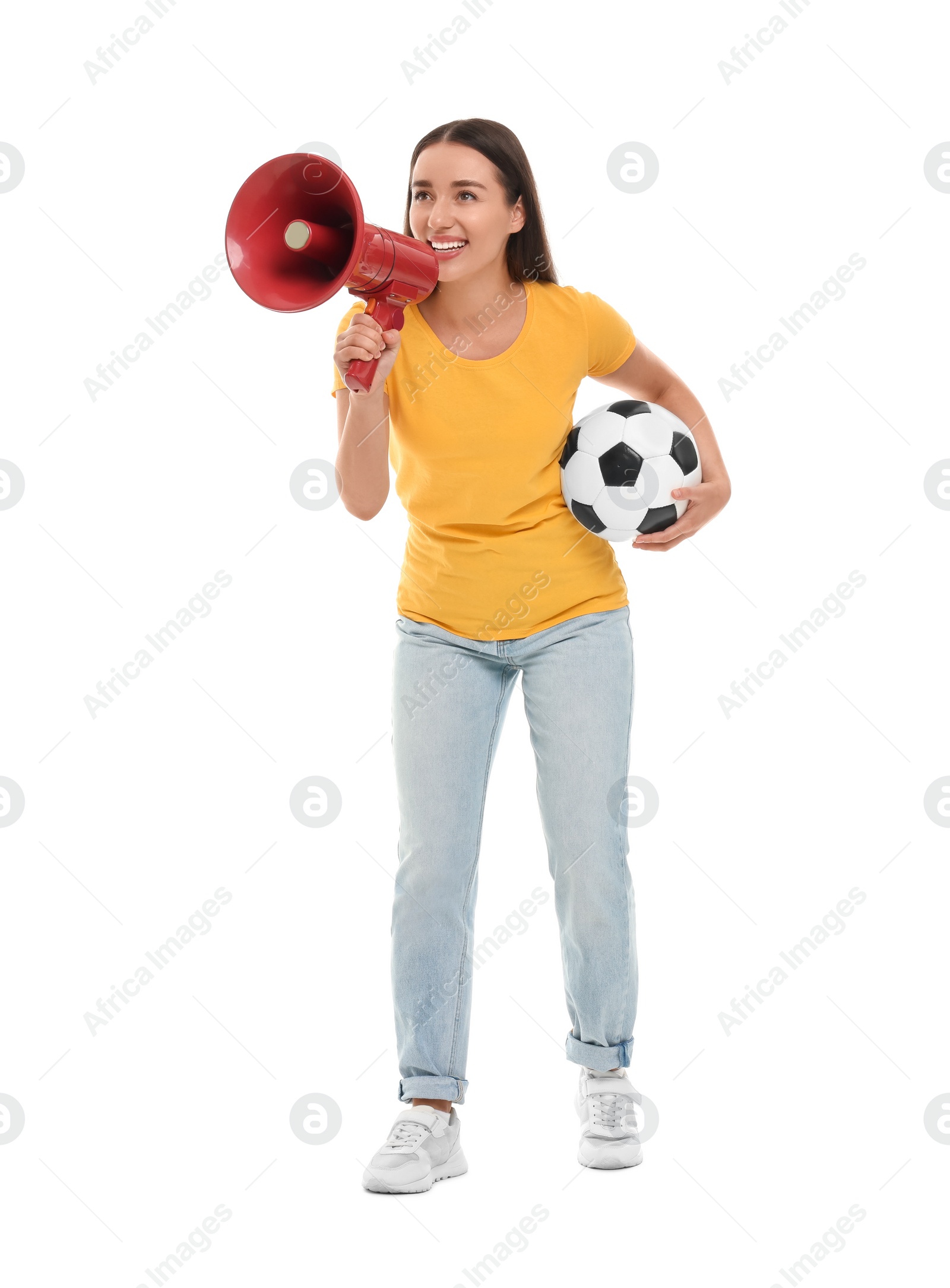 Photo of Happy fan with soccer ball using megaphone isolated on white