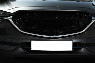Photo of Car with vehicle registration plate, closeup. Mockup for design