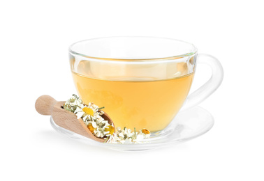 Fresh chamomile tea and dry flowers in scoop isolated on white