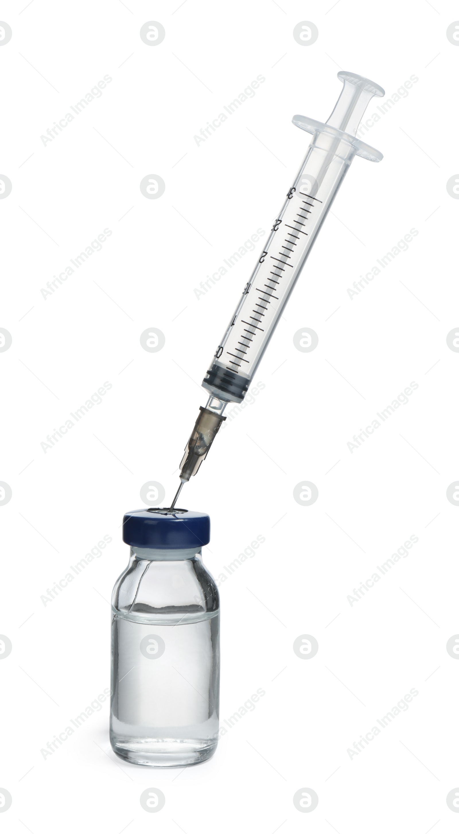 Photo of Syringe with vial of medicine isolated on white