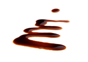 Smear of soy sauce spilled on white background