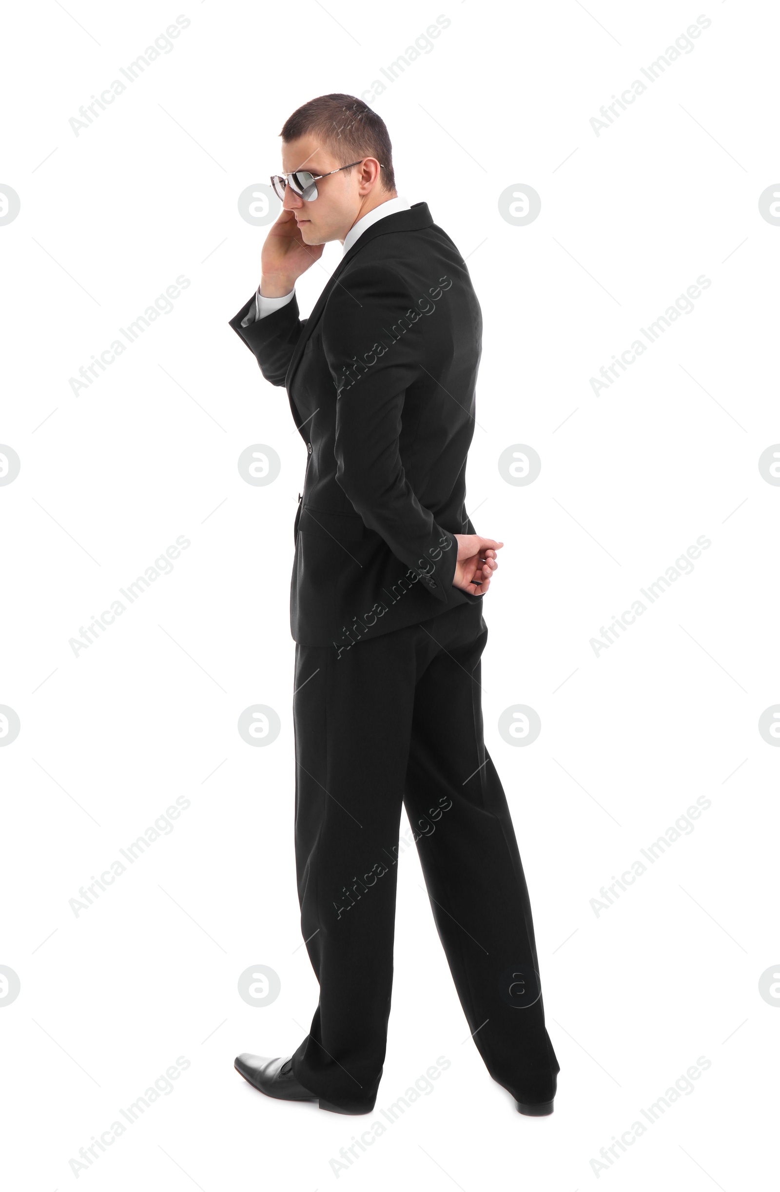 Photo of Male security guard in uniform on white background