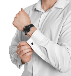 Man wearing stylish shirt and cufflinks on white background, closeup