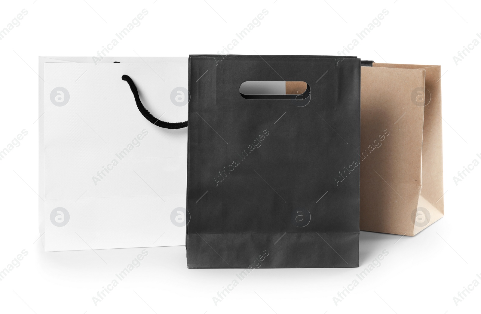 Photo of Paper shopping bags isolated on white. Mock up for design