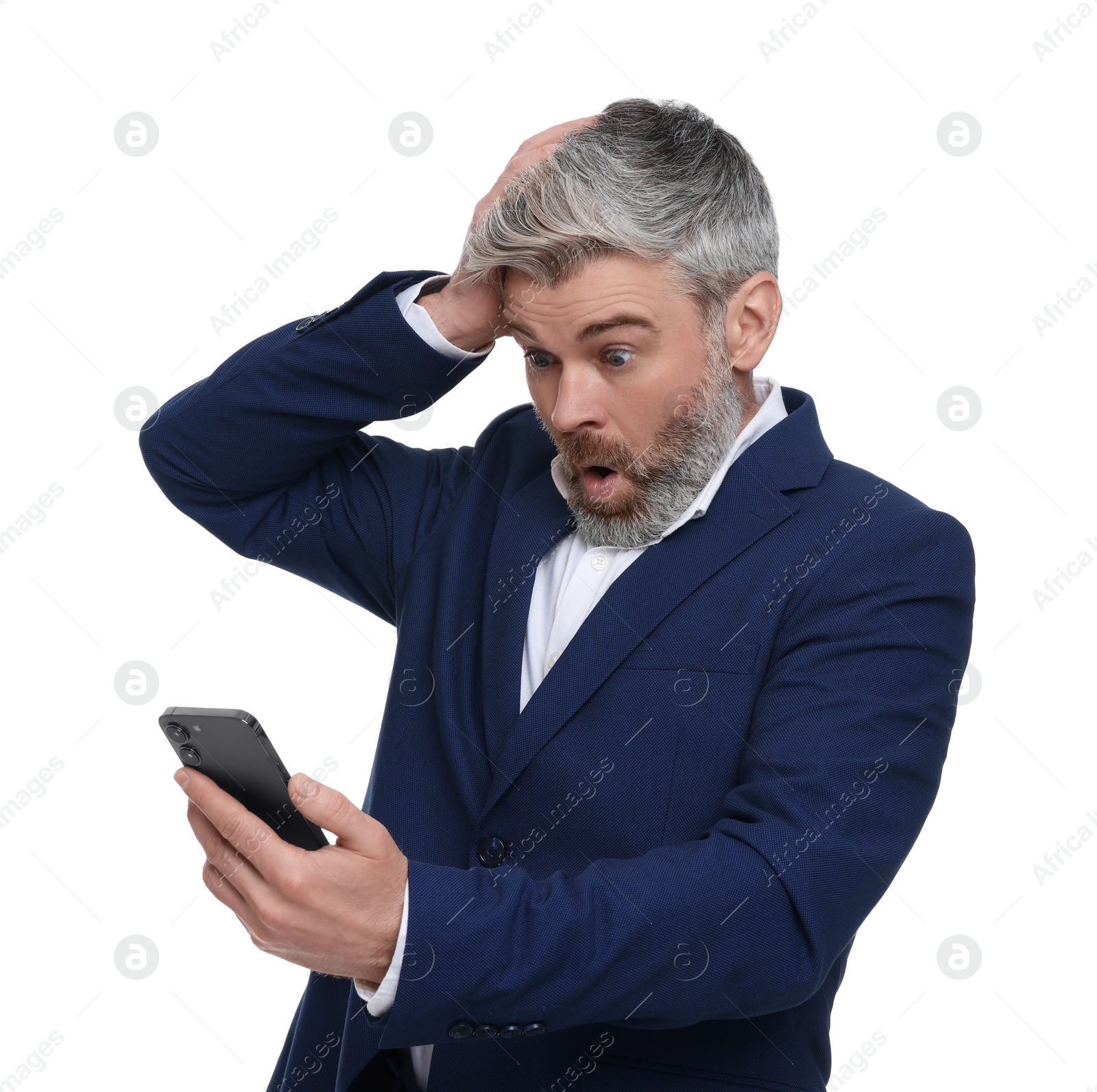 Photo of Emotional mature businessman in stylish clothes with smartphone on white background