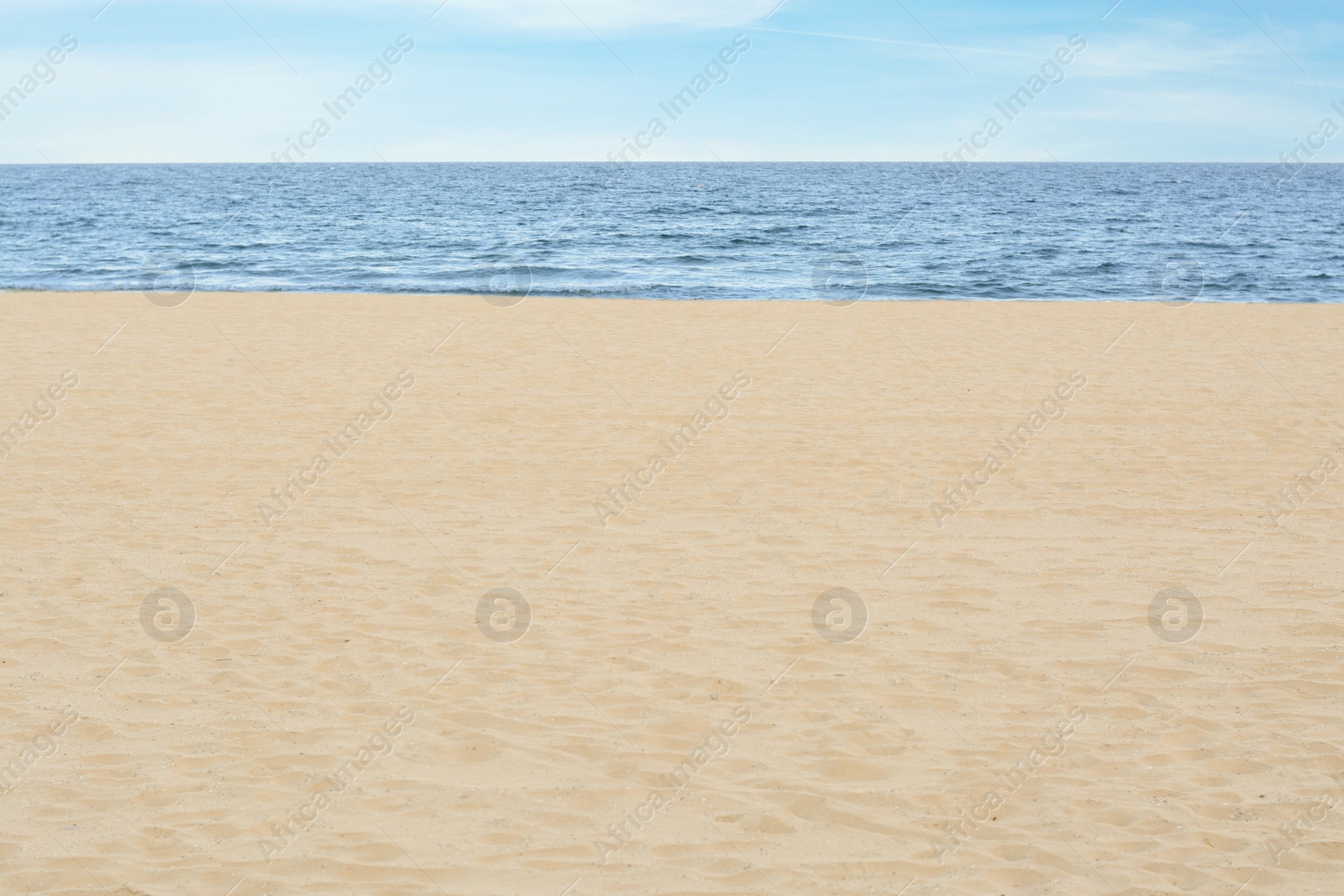 Photo of Beautiful view of sandy beach near sea