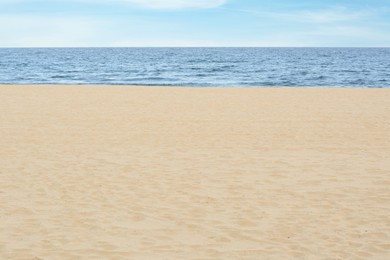 Photo of Beautiful view of sandy beach near sea