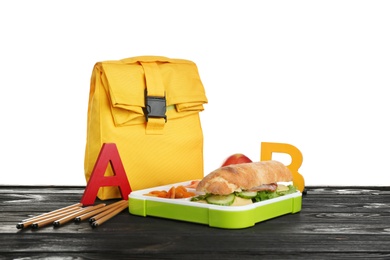 Photo of Composition with lunch box and food on table against white background