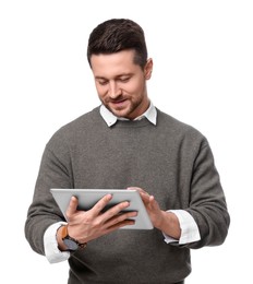 Photo of Handsome bearded businessman using tablet on white background