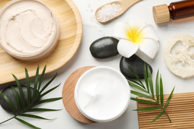 Photo of Flat lay composition with different spa products on white marble table