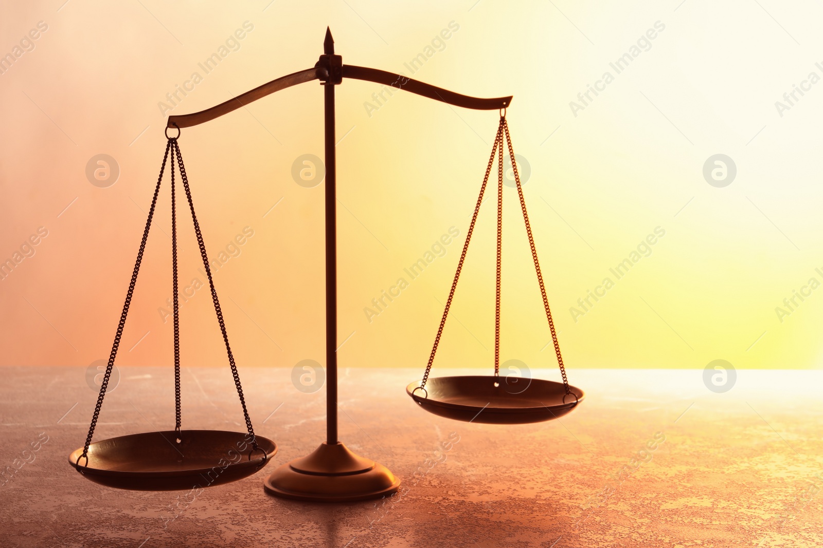 Photo of Scales of justice on table. Law concept