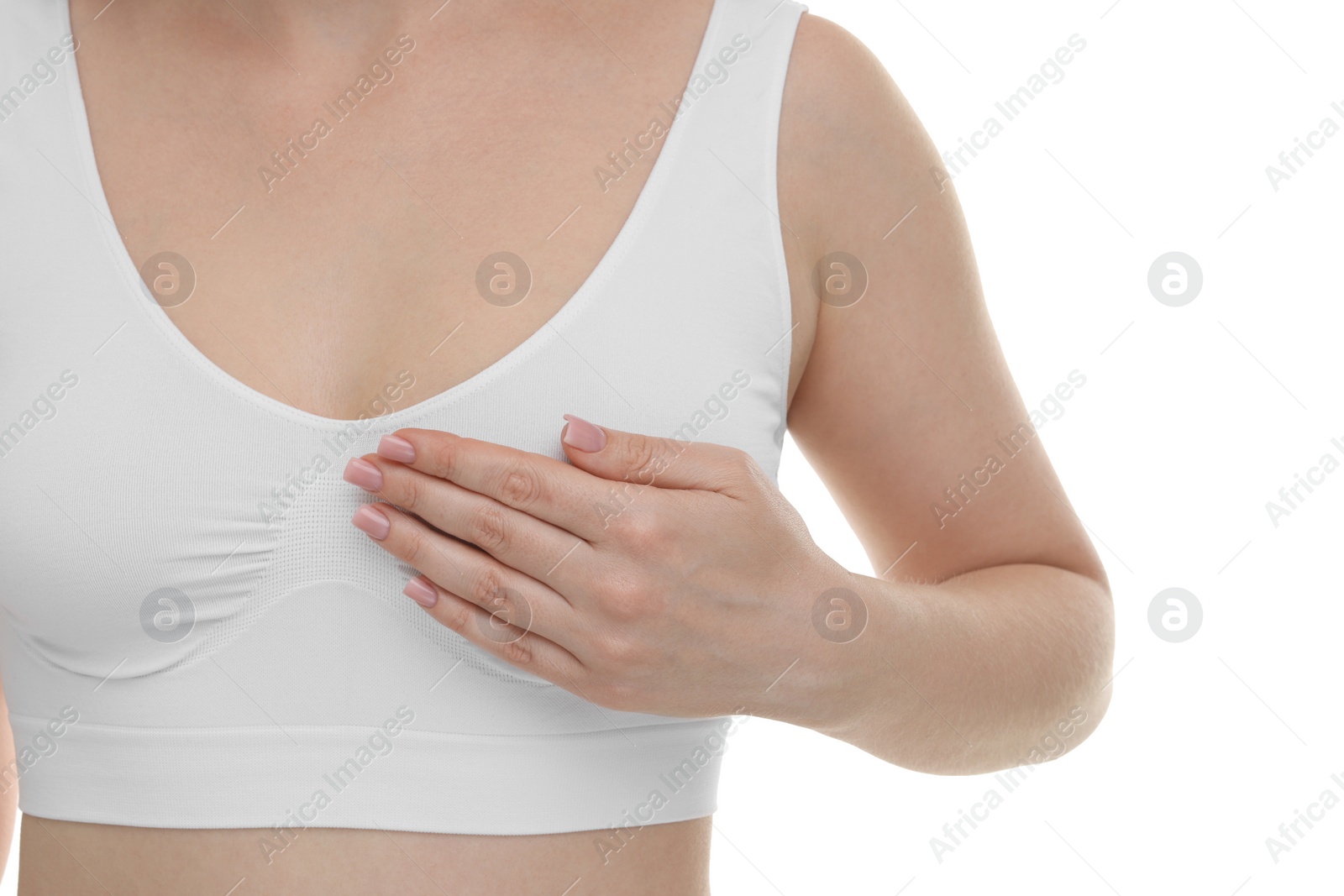 Photo of Mammology. Young woman doing breast self-examination on white background, closeup