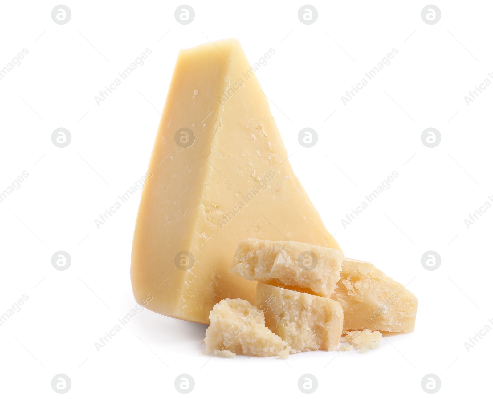 Photo of Pieces of delicious parmesan cheese on white background