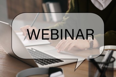 Image of Webinar concept. Woman working with laptop at table indoors, closeup