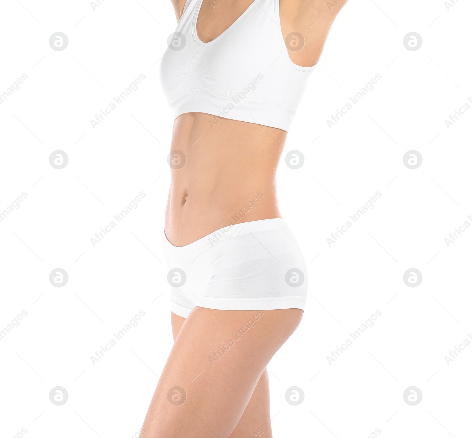 Photo of Young woman with perfect smooth skin on white background, closeup of belly. Beauty and body care