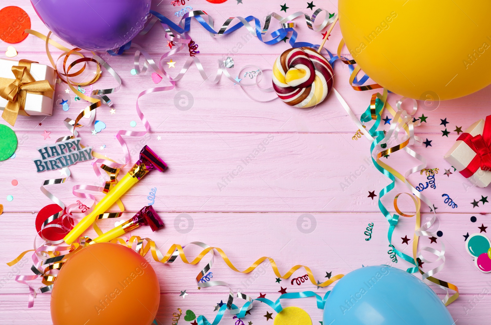 Photo of Flat lay composition with birthday party items on wooden background