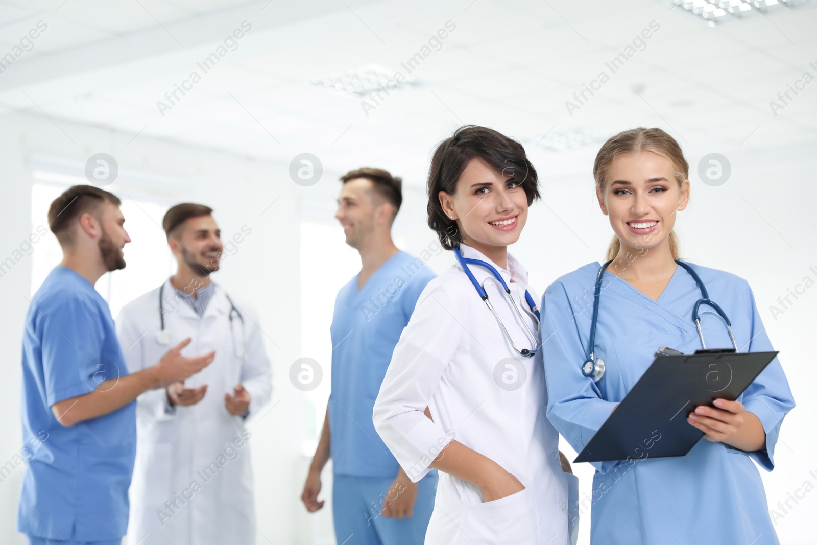 Photo of Portrait of doctors in uniform at workplace