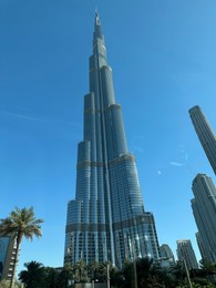 Dubai, United Arab Emirates - May 2, 2023: Beautiful view of Burj Khalifa in city under blue sky