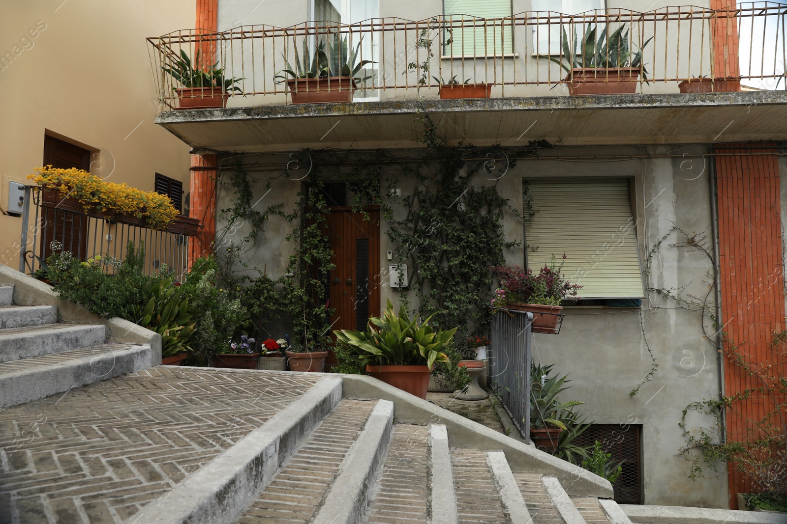 Photo of Old city street with beautiful building and stairs