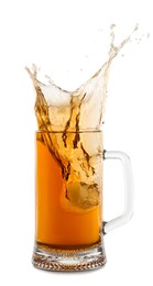 Beer splashing out of glass on white background