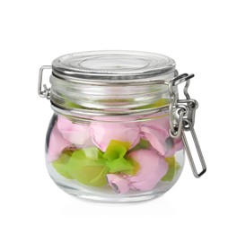 Photo of Glass jar with candies in colorful wrappers isolated on white