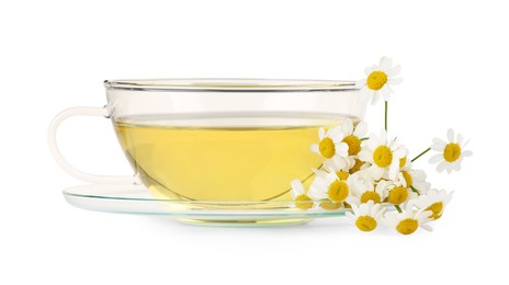 Photo of Aromatic herbal tea in glass cup and chamomiles isolated on white