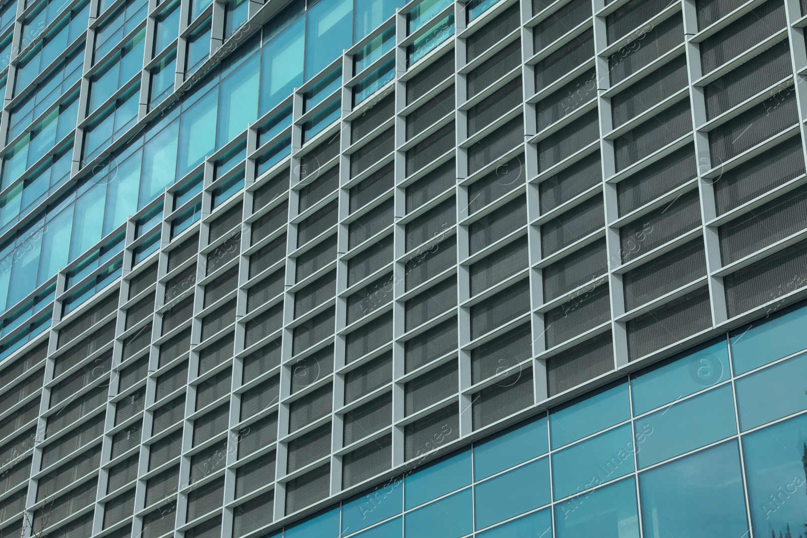 Photo of Modern building, low angle view. Urban architecture