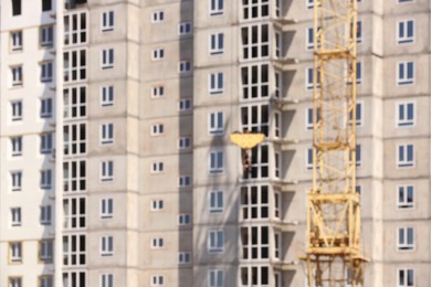 Photo of Blurred view of unfinished building and tower crane