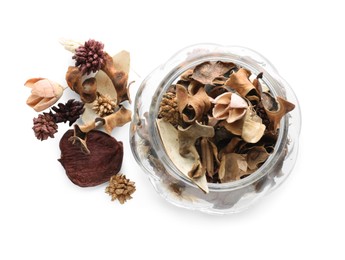Photo of Aromatic potpourri of dried flowers in glass jar on white background, top view