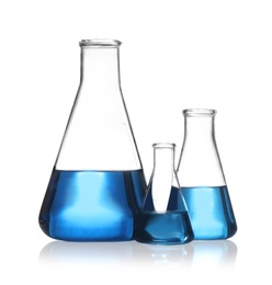Conical flasks with blue liquid isolated on white. Laboratory glassware