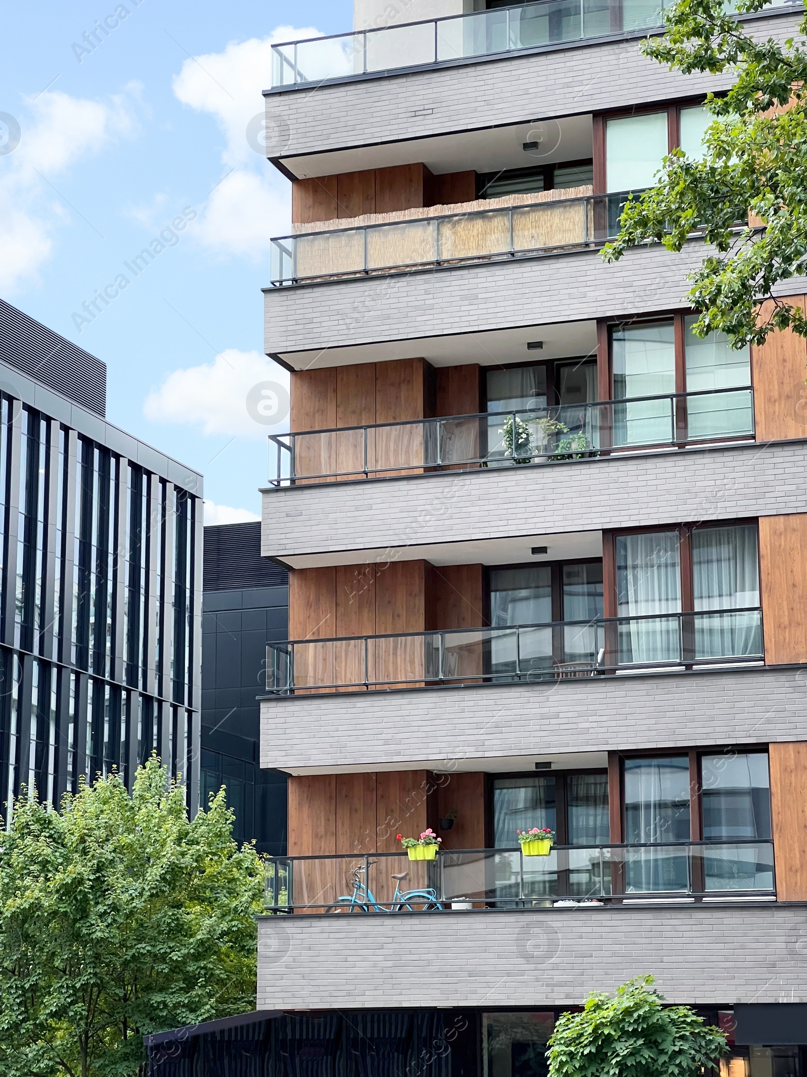 Photo of Exterior of modern residential building with balconies