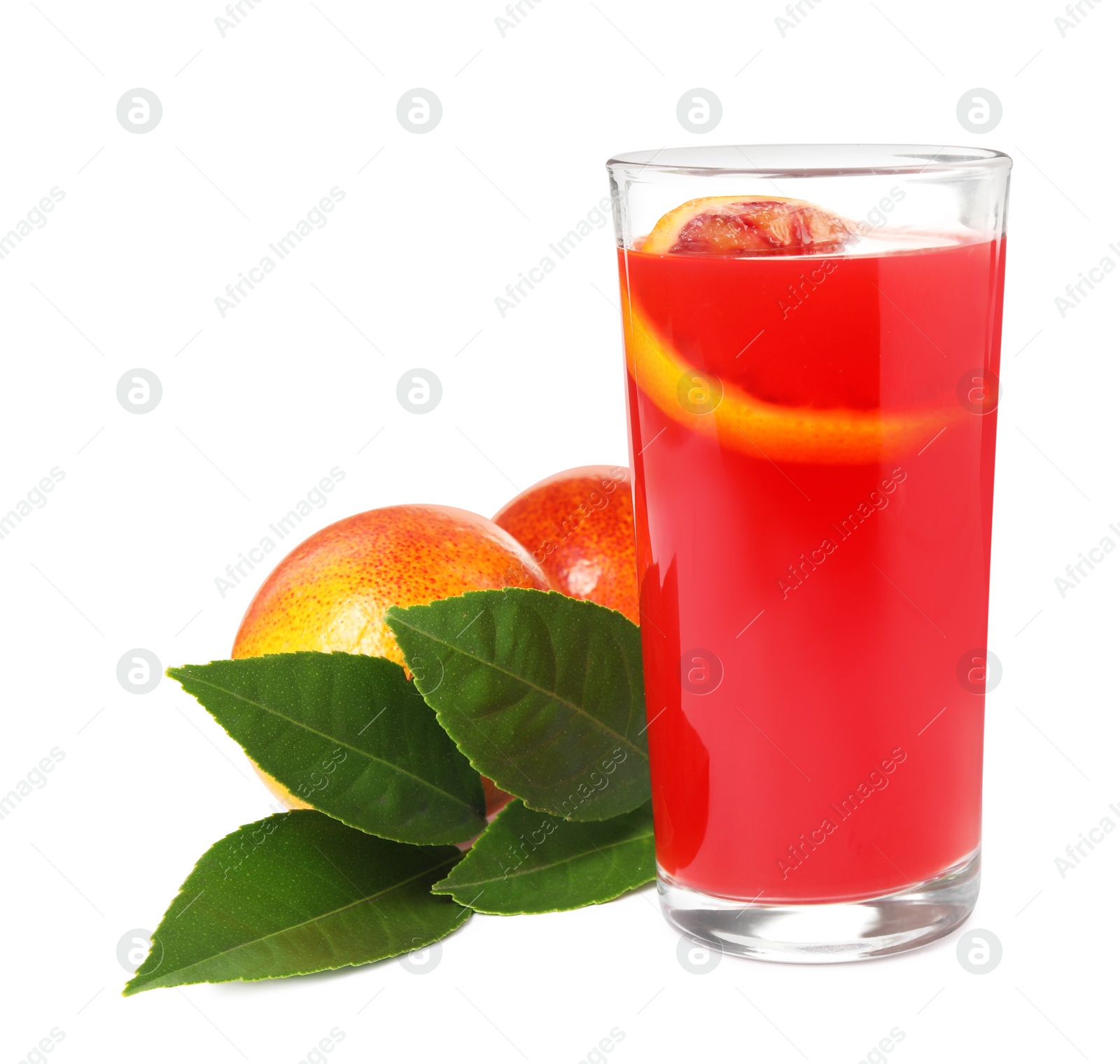 Photo of Tasty sicilian orange juice in glass, fruits and leaves on white background