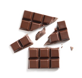 Pieces of tasty black chocolate on white background, top view