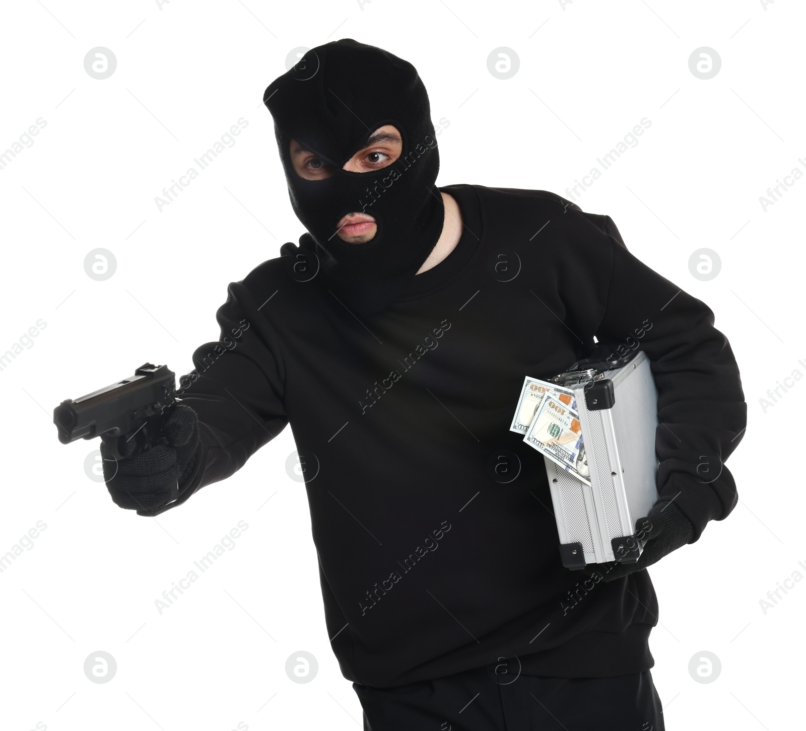 Photo of Thief in balaclava with gun and briefcase of money on white background