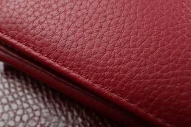 Beautiful red leather as background, closeup view