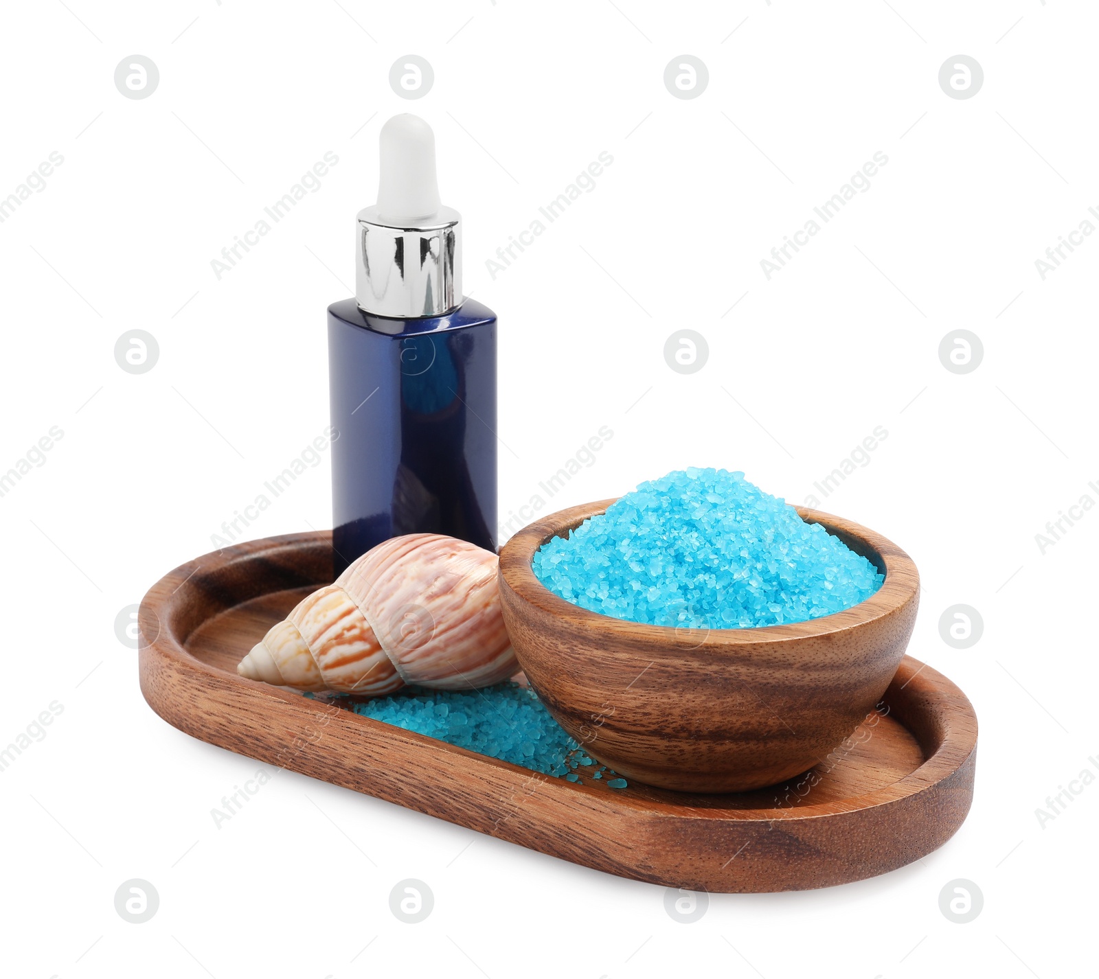 Photo of Light blue sea salt in bowl, shell and cosmetic product isolated on white