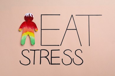 Photo of Words Heat Stress with human cutout on beige background, top view