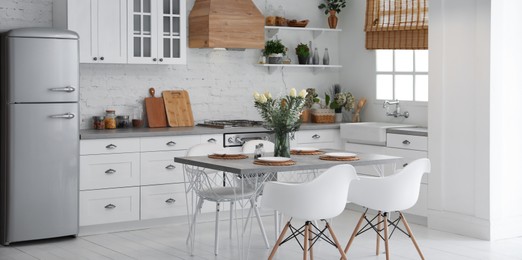 Image of Beautiful kitchen interior with new stylish furniture. Banner design
