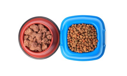 Photo of Dry and wet pet food in feeding bowls isolated on white, top view