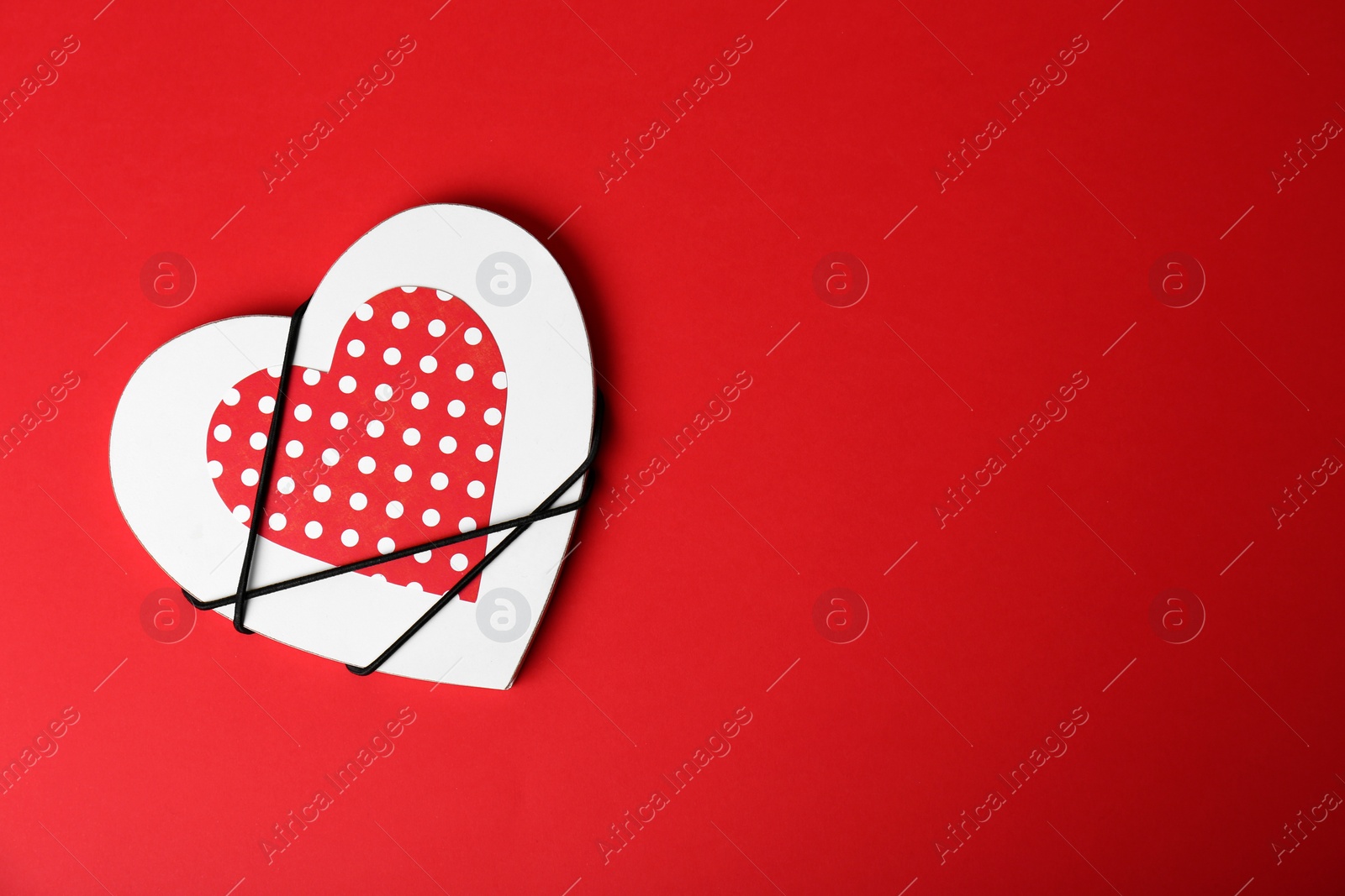Photo of Decorated heart and space for text on color background, top view