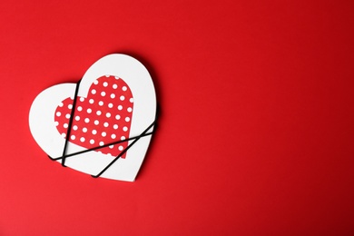Decorated heart and space for text on color background, top view