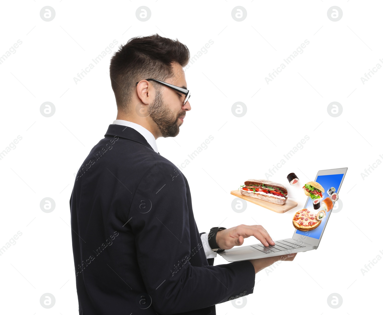 Image of Young man using laptop for ordering food online on white background. Delivery service during quarantine